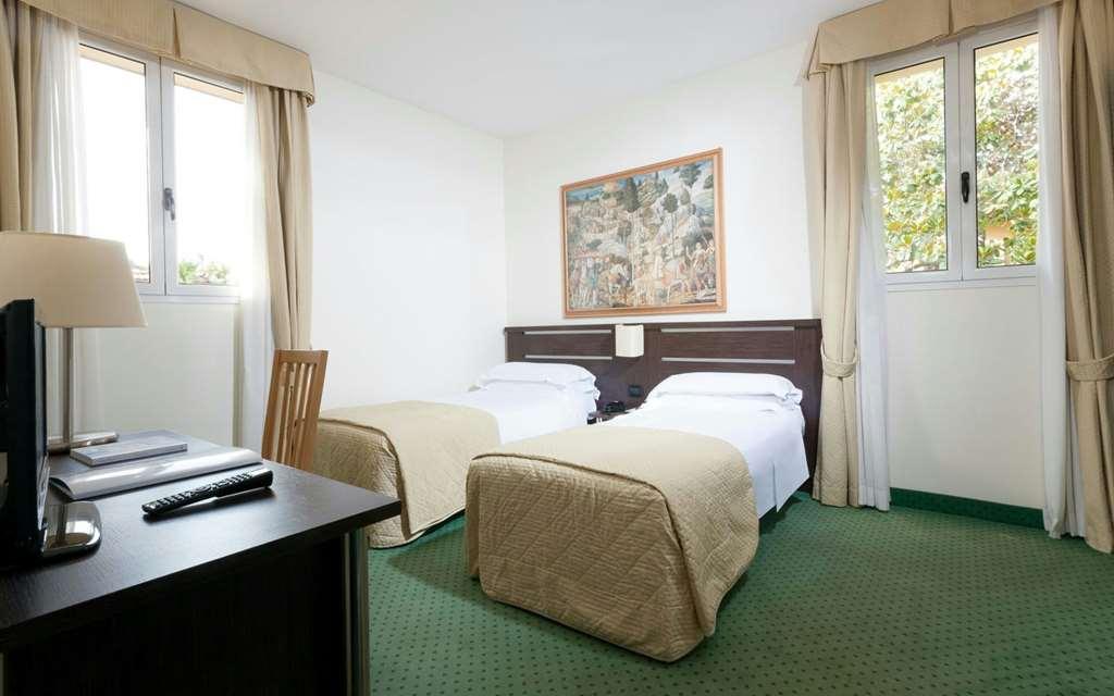 The Church Village Rome Room photo